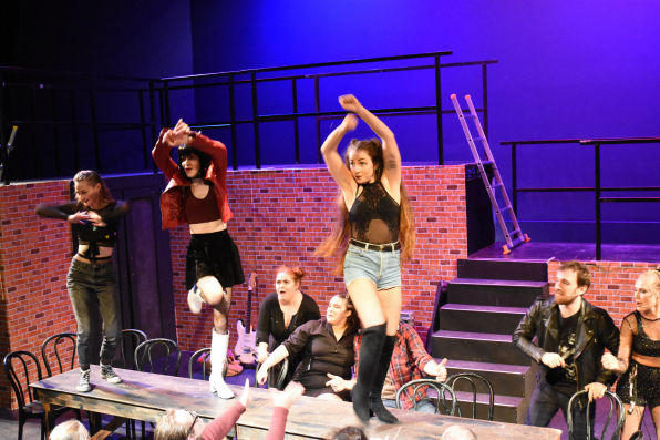 Actor on stage in the musical called RENT